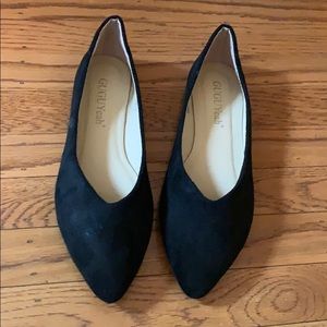 Black flat slip on shoes